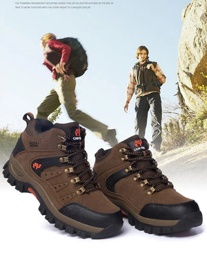 A pair of brown and black hiking boots with metal lace hooks, shown in the foreground against a faded outdoor background of two men hiking on a rocky trail. The brand name 'Cactus' is visible on the tongue of the boots.