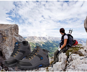 Hiking boots with a mountainous landscape in the background