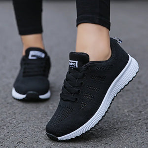 Women's breathable mesh walking sneakers with stretch-fabric upper, lace-up closure, and lightweight EVA outsole