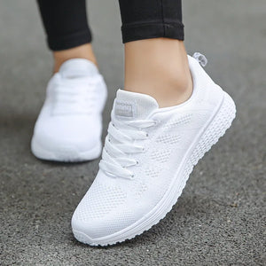 Women's breathable mesh walking sneakers with stretch-fabric upper, lace-up closure, and lightweight EVA outsole