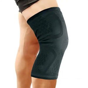 Black compression shorts being worn on a white background