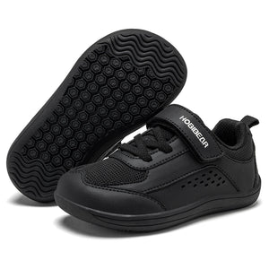 A pair of black toddler sneakers, with one shoe showing the textured sole and the other showing the side profile with a hook-and-loop strap featuring the brand name HOBIEAR.