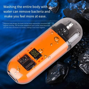 Orange nose hair trimmer with water droplets on a rocky surface background