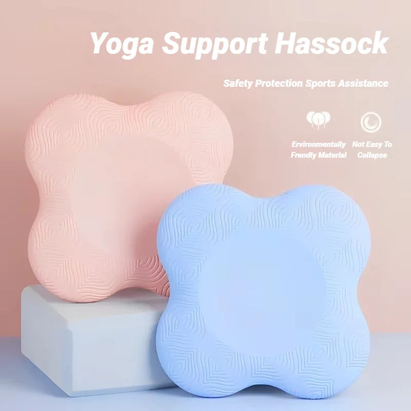 Pink and blue yoga support hassocks on a light pink background with text about safety, protection, and assistance.