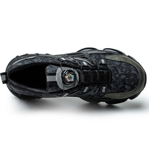 Black athletic work shoe with a unique sole design on a white background
