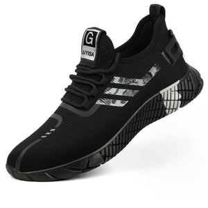 A black knit athletic sneaker with a textured sole, featuring three abstract silver and gray stripes on the side and a white tongue label with a black 'G' and 'GUY VISA' text.