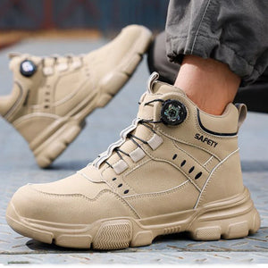 Beige safety boots with a visible brand logo on a blurred background