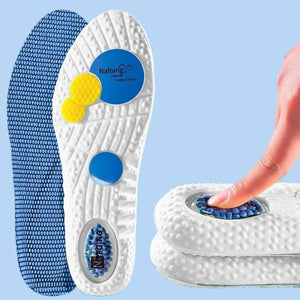 Pair of damping air cushion insoles with a hand pressing on one, on a blue background.