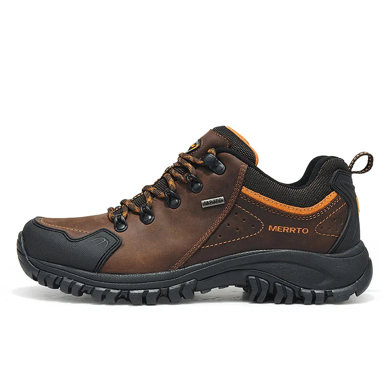 Brown hiking shoe with black accents on a white background