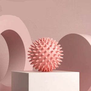 Pink textured ball on a white platform with '5pcs' text on a pink background