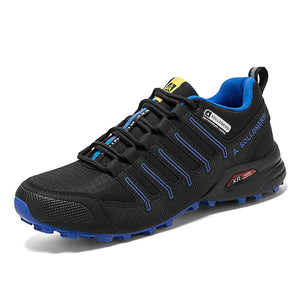 Black and blue athletic shoe on a white background