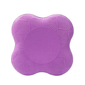 Purple textured square mat on a white background