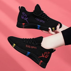 Women's lightweight stretch-fabric casual sneakers in red and purple with a low platform profile