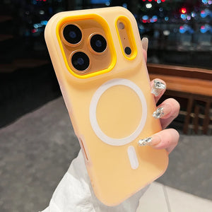 Yellow phone case with a unique design held by a person.