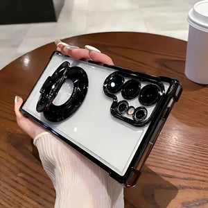 Person holding aClear Samsung Galaxy case with electroplated frame and magnetic ring stand with camera lens design on a wooden table