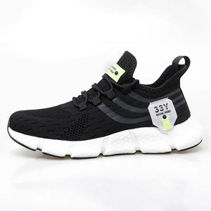 Black running shoe with white sole on a white background