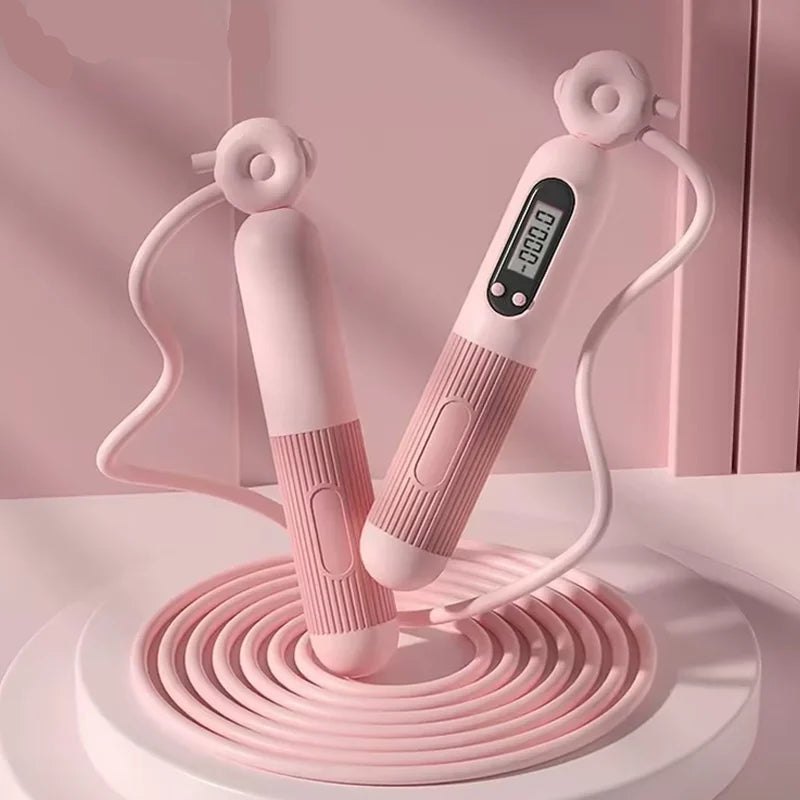 Pink Smart jump rope with digital counter on a pink background