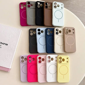 Collection of colorful phone cases on a round surface
