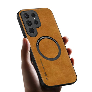 Brown phone case with magnetic card holder held by a hand on a white background
