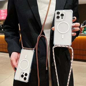 Person holding two Shockproof Magnetic Clear iPhone Case with Hanging Rope Cover with straps in an indoor setting
