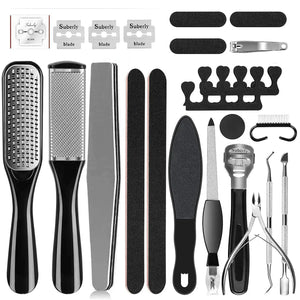 Collection of black and silver pedicure tools on a white background
