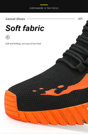 Black and orange safety work boot with soft fabric description on a white background