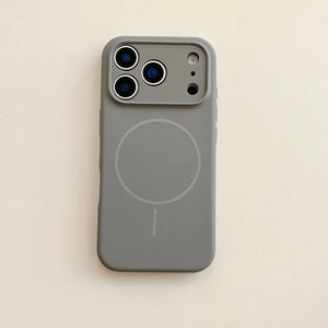 Gray phone case with magnetic design on a beige background