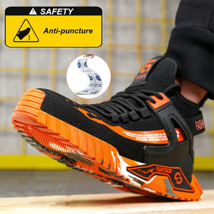 Black and orange safety shoe with anti-puncture feature on a blurred background