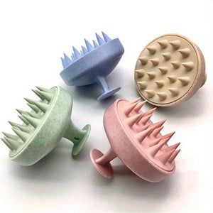 Four textured scalp massage brush in pastel colors on a white background
