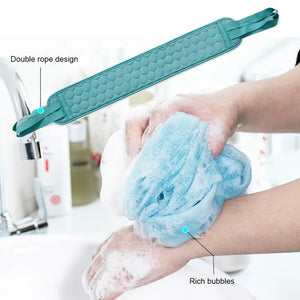 Blue loofah with double rope design being used in a bathroom setting
