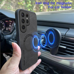 Phone case with iron ring for magnetic car holder held by a hand in front of a car's air vent.