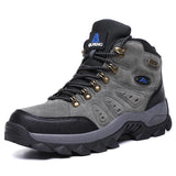 Gray hiking boot with black accents on a white background