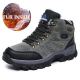 Gray hiking boot with black sole on a white background, featuring a 'Fur Inside' label.