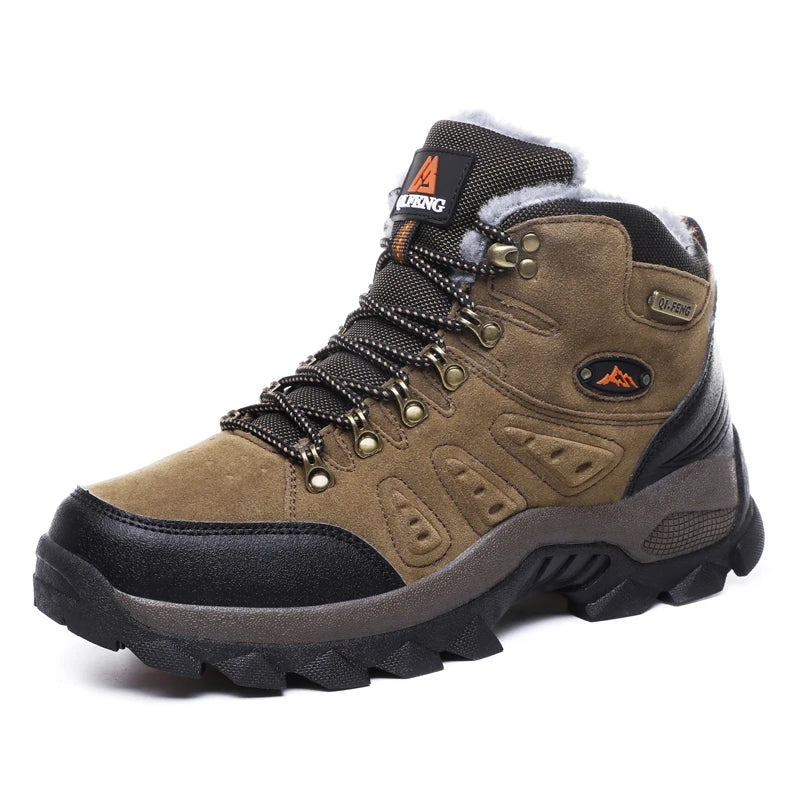 Brown hiking boot with black sole on a white background