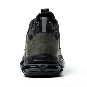 Black and gray work sneaker with a visible brand logo on a white background