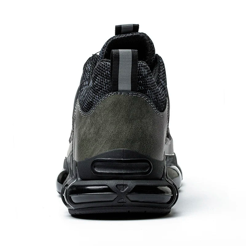 Black and gray work sneaker with a visible brand logo on a white background