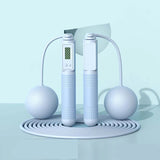 White jump rope with digital display on a light blue background, labeled 'Dual purpose' and 'Blue'.