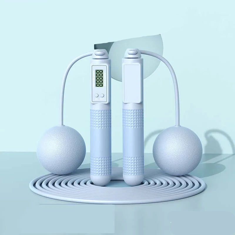 White jump rope with digital display on a light blue background, labeled 'Dual purpose' and 'Blue'.