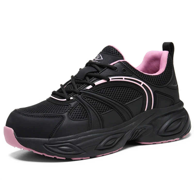 A black women's work shoes sneaker with pink accents, featuring a breathable mesh upper, black laces, a pink inner lining, and a chunky black sole with pink detailing, shown against a plain white background.