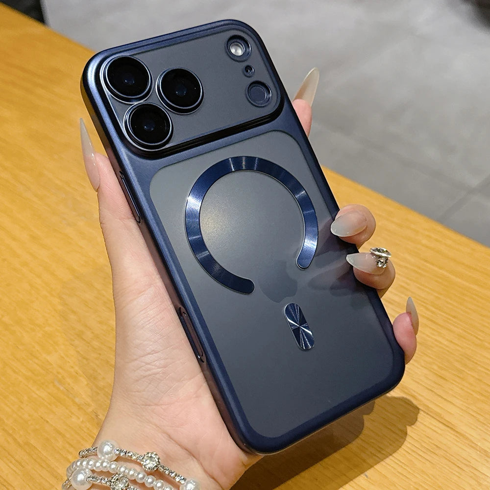 Phone case with a ring holder held by a hand on a wooden surface
