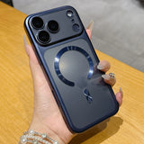 Phone case with a ring holder held by a hand on a wooden surface