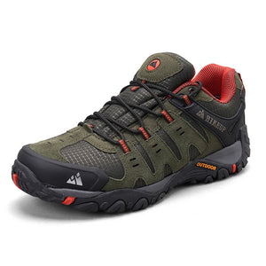 Green hiking shoe with red accents on a white background.