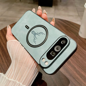 Leather Magnetic Case for Pixel with a scorpion design held by a person on a wooden surface.