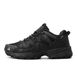 Black hiking shoe on a white background
