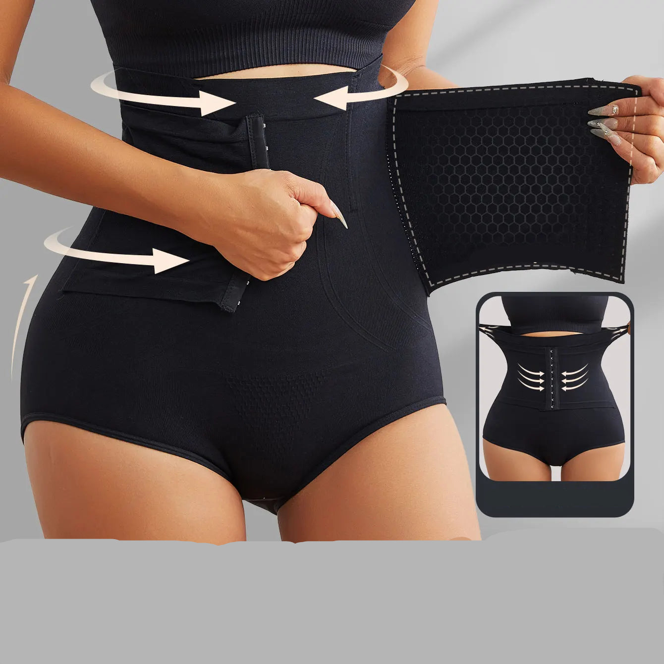 Black waist trainer with high compression feature, showing close-up details on a gray background.