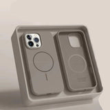 Silicone phone case with magnetic design on a light gray background