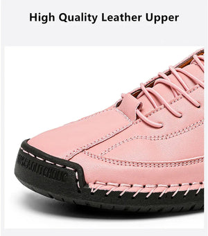 Pink leather shoe with high-quality leather upper on a white background