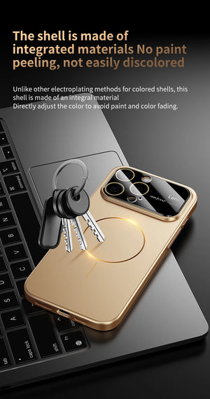 Gold phone case with keychain on a laptop