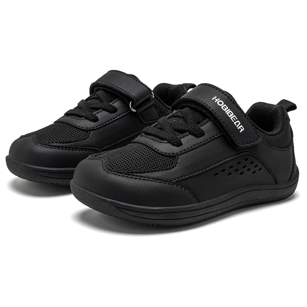 A pair of black toddler sneakers with mesh panels, hook-and-loop straps, and the brand name 'HODIBEAR' printed in white on the side strap, set against a plain white background.