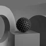Black spiked ball on a gray pedestal with '5pcs' text above.